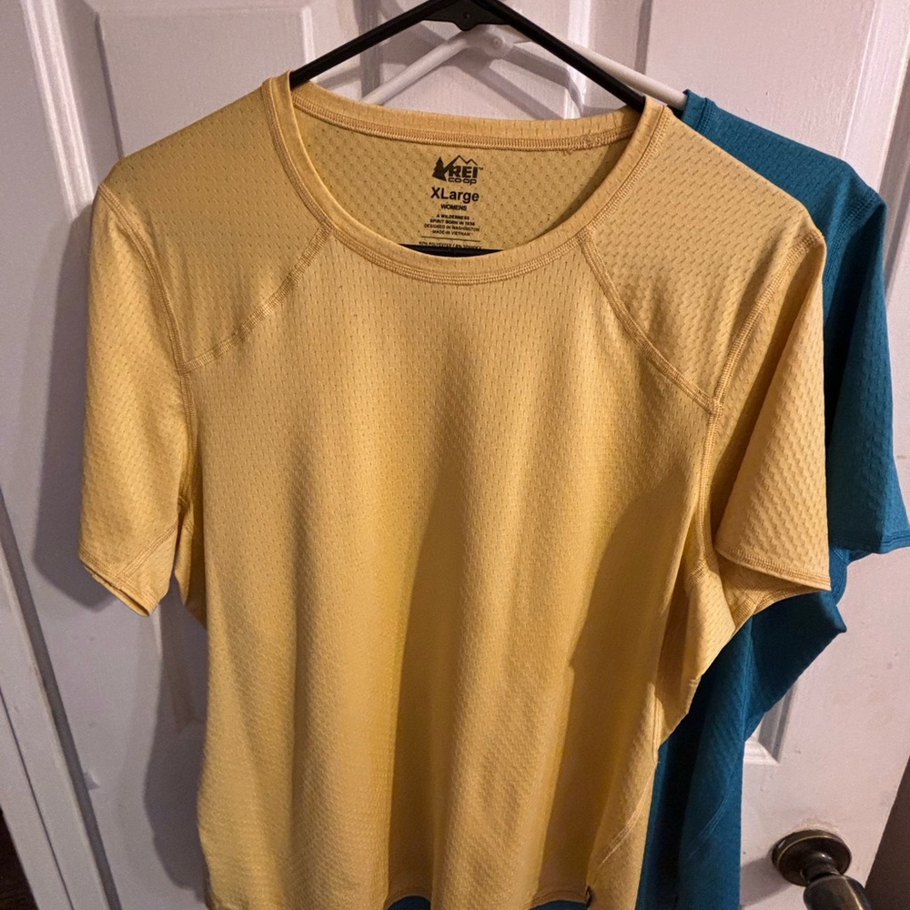 2 REI Co-op Women's T-Shirts. 1 is mustard; the other is teal.Look to bundle.